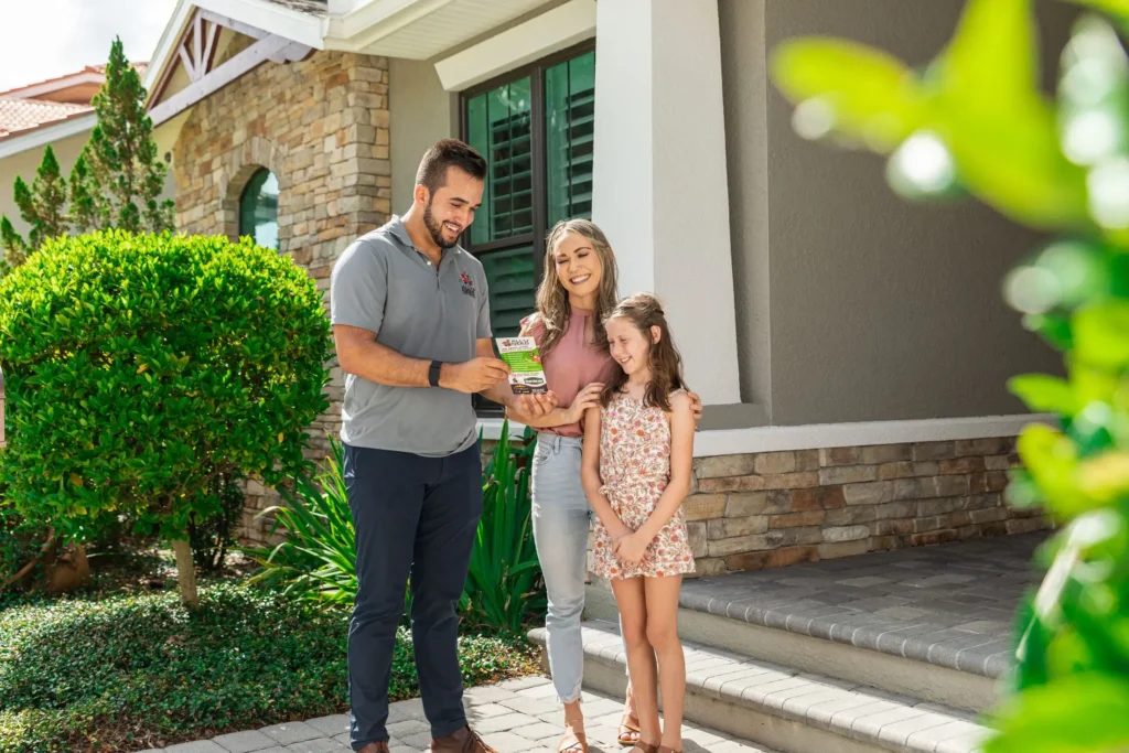 Family reading All 'U' Need Pest Control Brochure