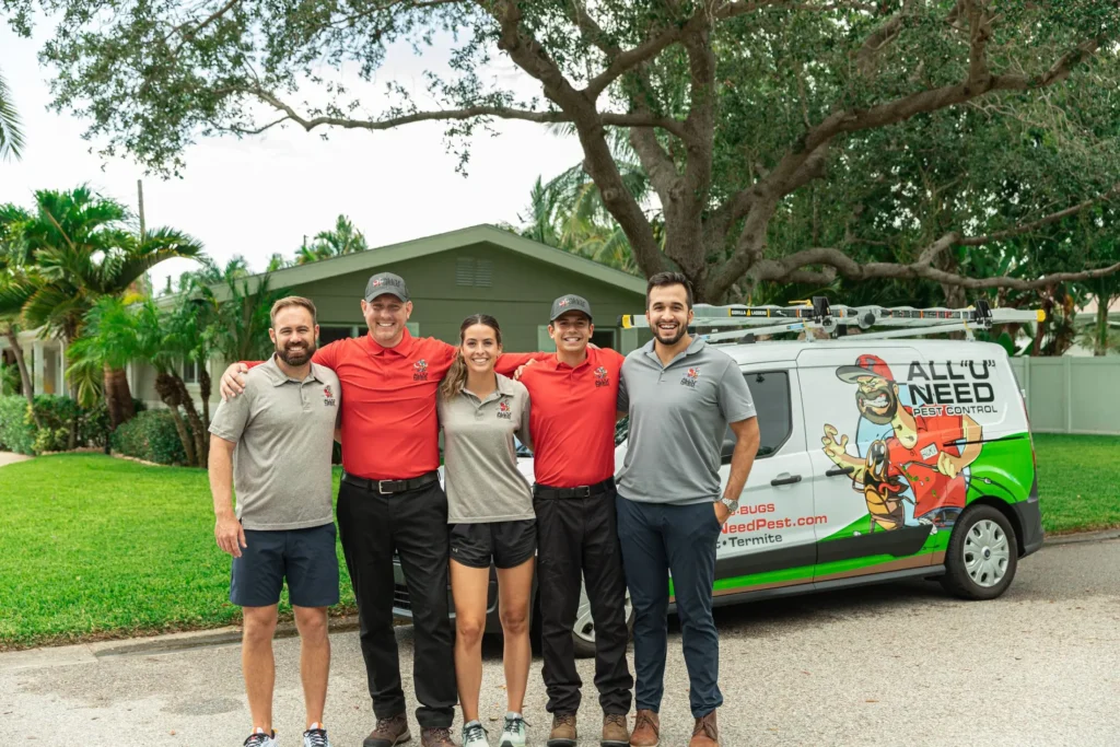 Group of pest control workers smiling